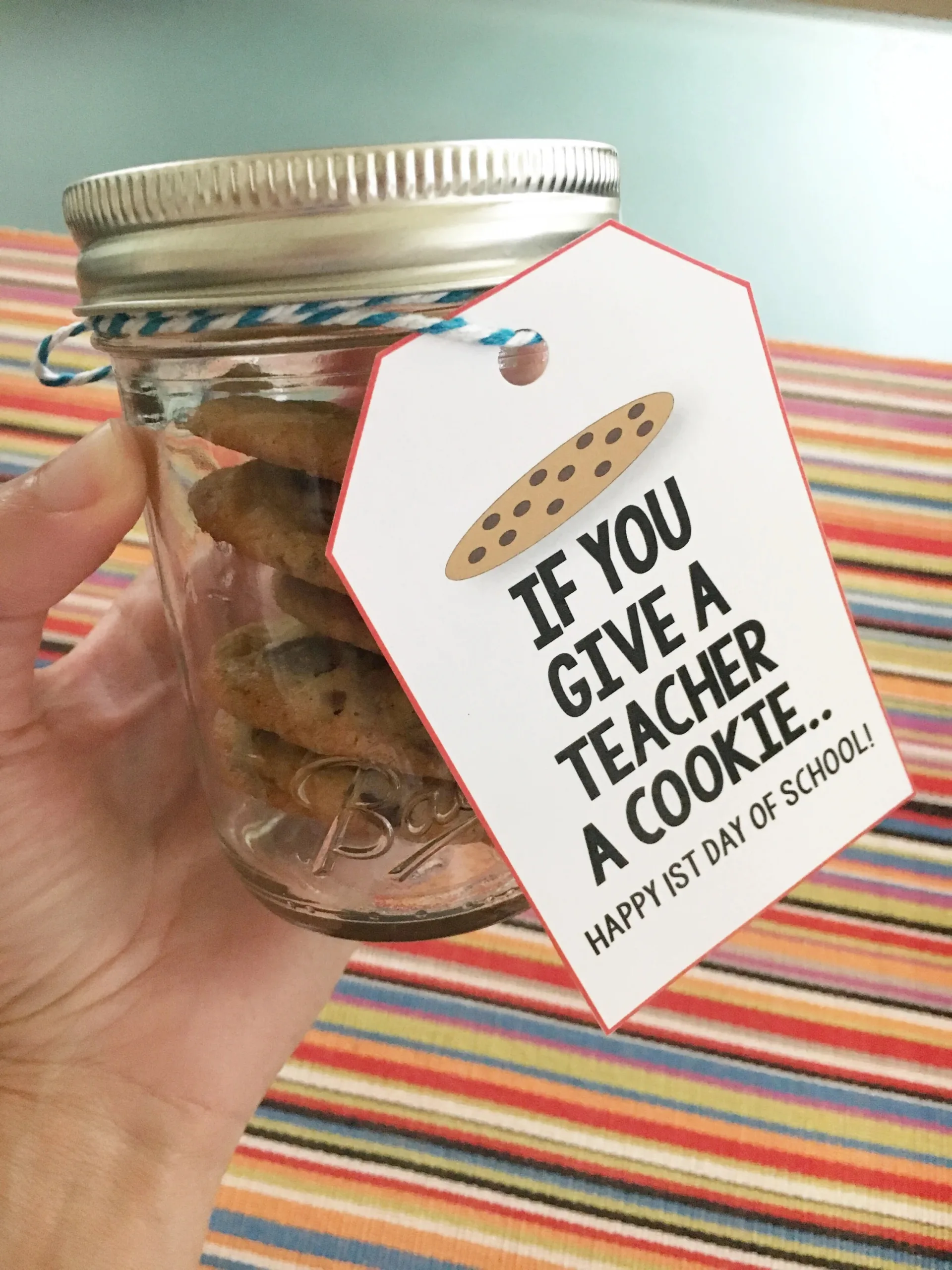 Mason jar of cookies with teacher tag