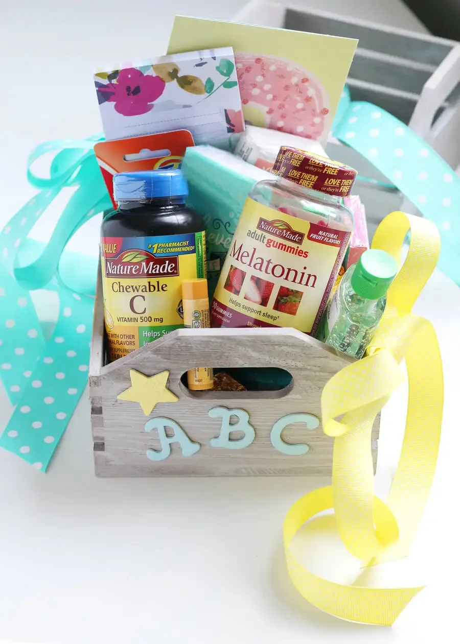 Wooden ABC crate filled with supplies